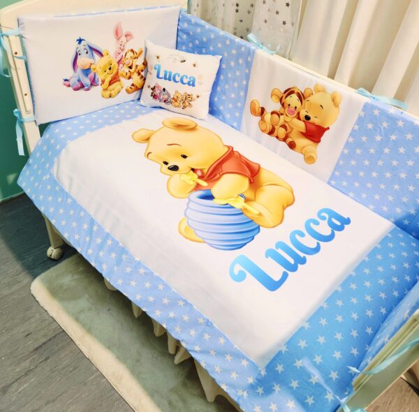 Modelo Proteção total «Winnie bebé estrelas»