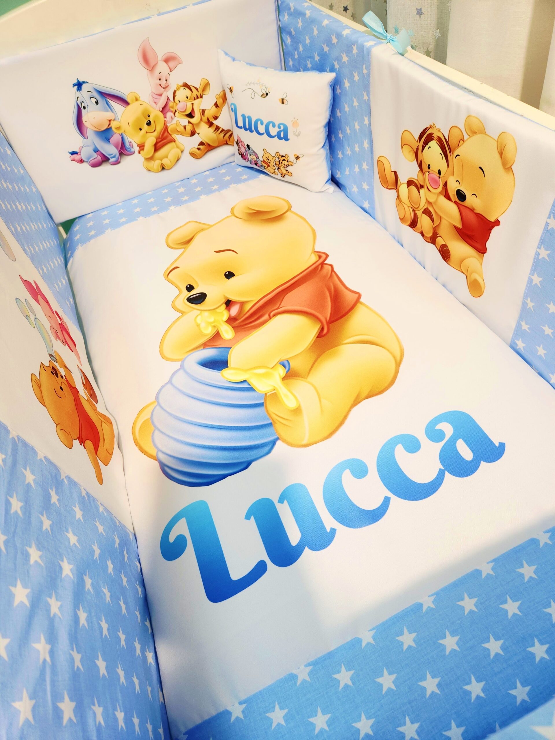 Modelo Proteção total «Winnie bebé estrelas»